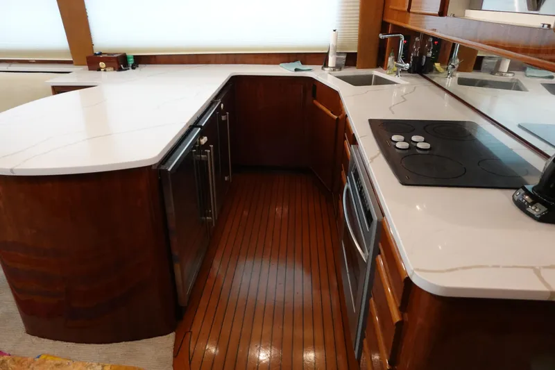 Slide: The Image of Luxurious kitchen interior of 1988 Donzi Z-65 Tournament Fisherman yacht with modern appliances. - 25