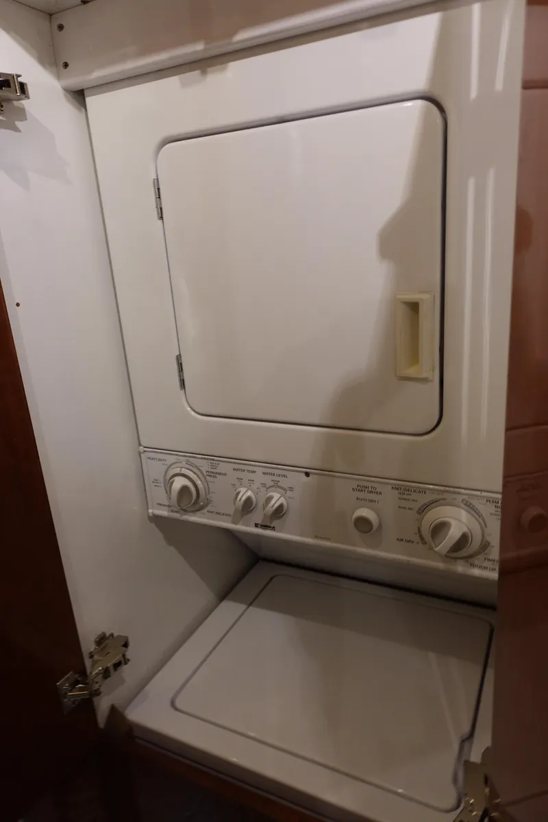 Slide: The Image of Stacked washer and dryer unit inside 1988 Donzi Z-65 Tournament Fisherman boat. - 32