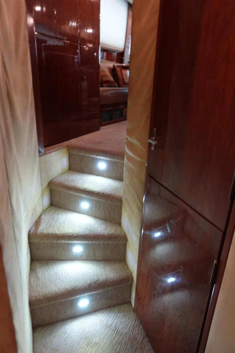 Slide: The Image of Interior of 1988 Donzi Z-65 Tournament Fisherman with illuminated carpeted stairs. - 33