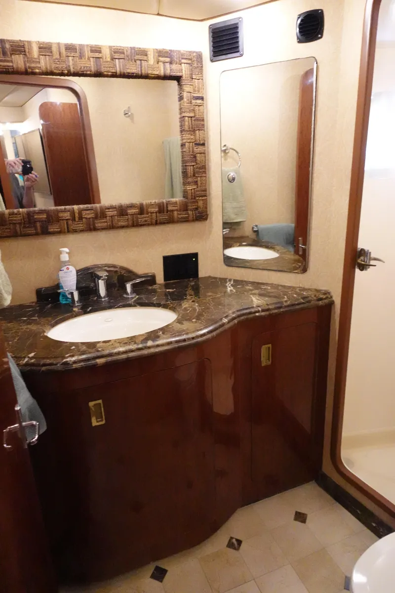 Slide: The Image of Luxurious bathroom in 1988 Donzi Z-65 Tournament Fisherman yacht with marble countertop. - 37