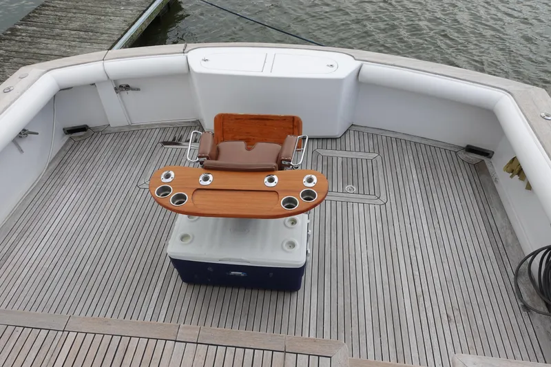 Slide: The Image of 1988 Donzi Z-65 Tournament Fisherman boat deck with fishing chair and rod holders. - 9