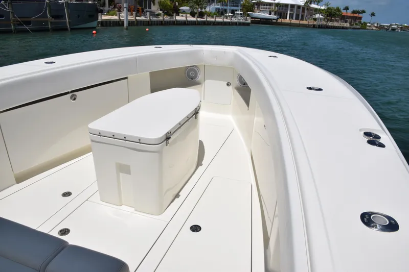 Slide: The Image of 2015 SeaVee 370z boat deck with storage and seating. - 15