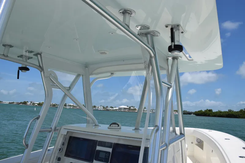 Slide: The Image of SeaVee 370z 2015 boat console with T-top and ocean view. - 27
