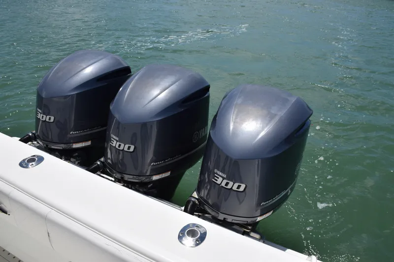 Slide: The Image of Triple Yamaha 300 outboard engines on a 2015 SeaVee 370z boat. - 37