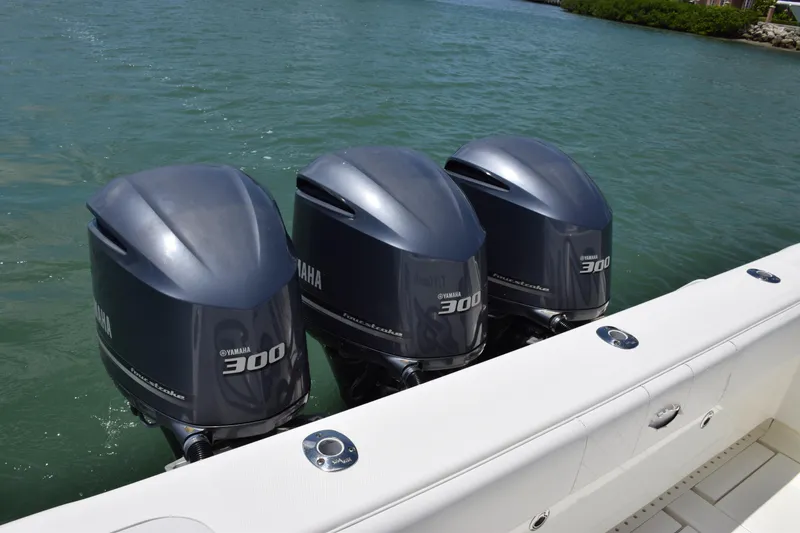 Slide: The Image of 2015 SeaVee 370z boat with triple Yamaha 300 outboard engines. - 38