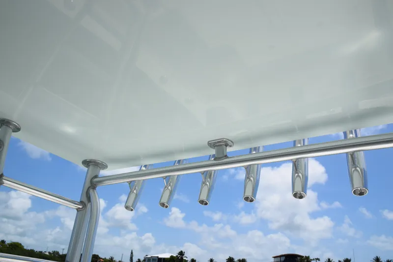 Slide: The Image of Rod holders on a 2015 SeaVee 370z boat against a blue sky background. - 41