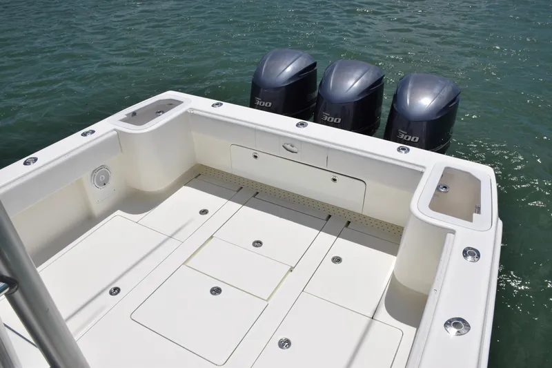 Slide: The Image of 2015 SeaVee 370z boat with triple 300 horsepower engines on water. - 42