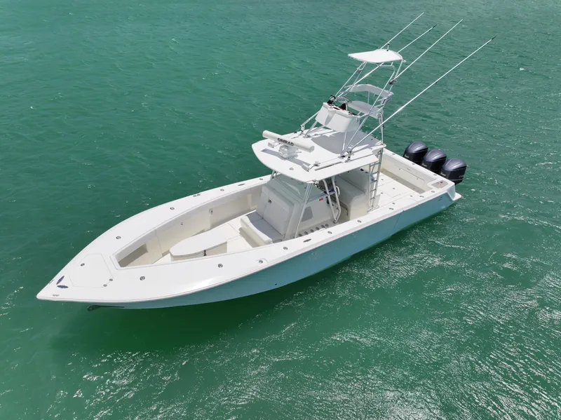 Slide: The Image of 2015 SeaVee 370z boat on clear turquoise water. - 7