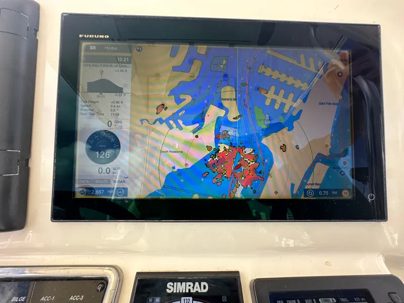 Slide: The Image of Navigation system display on a 2016 Cobia 296CC boat. - 20