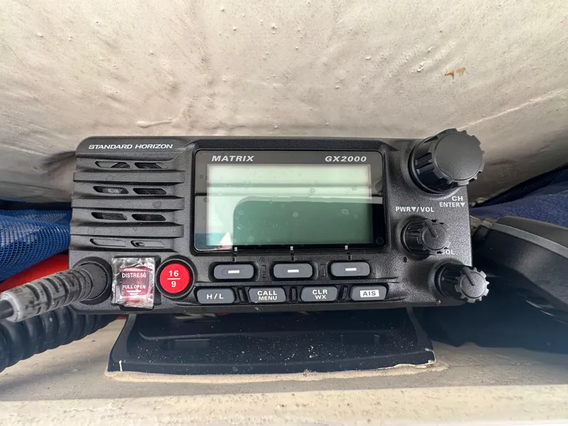 Slide: The Image of Standard Horizon Matrix GX2000 marine radio on a 2016 Cobia 296CC boat. - 25