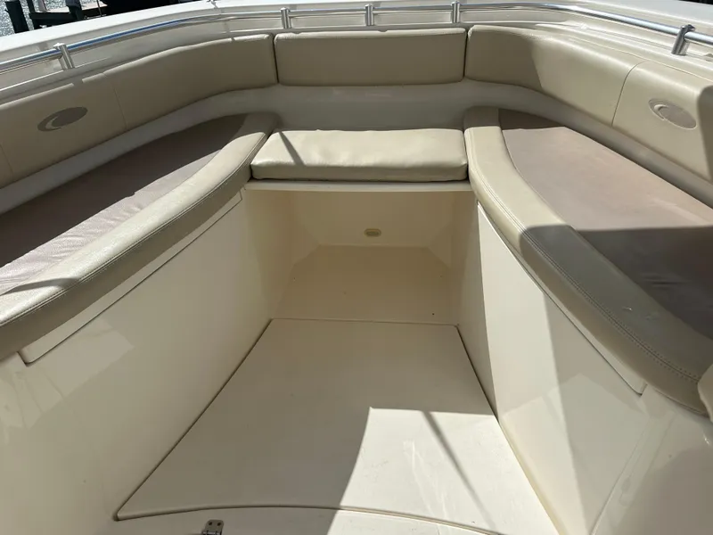 Slide: The Image of 2016 Cobia 296CC boat interior seating area. - 38