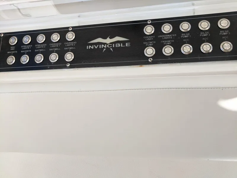 Slide: The Image of Control panel of a 2014 Invincible 42 Open Fisherman boat. - 5