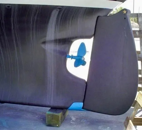 Slide: The Image of 1983 Cherubini Schooner hull and rudder with blue propeller. - 21
