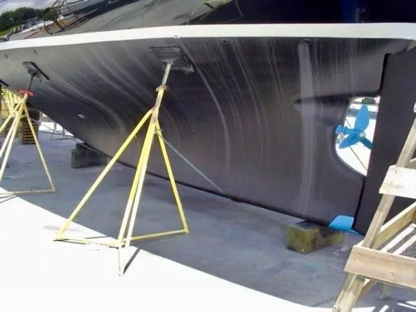 Slide: The Image of 1983 Cherubini Schooner hull on stands during maintenance. - 22