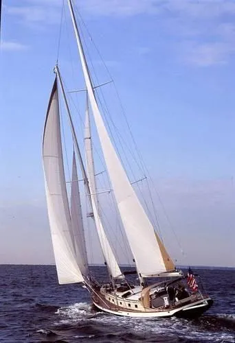Slide: The Image of 1983 Cherubini Schooner sailing on open water. - 23