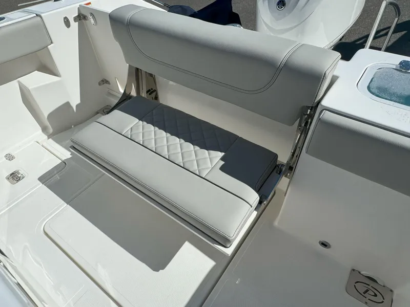 Slide: The Image of Livewell on 2025 Pursuit S 248 boat, featuring a sleek design. - 8