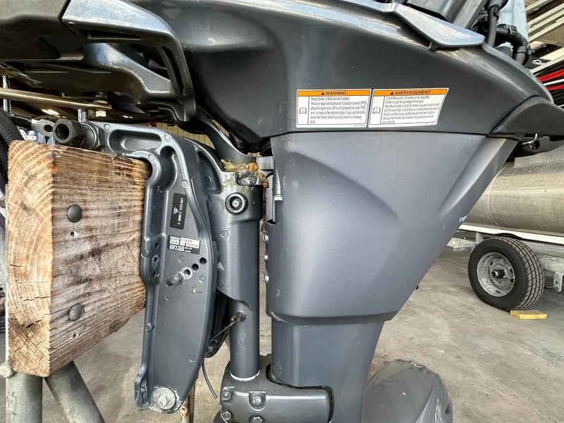Slide: The Image of 2018 Yamaha Outboards F20LPA motor mounted on a boat. - 14