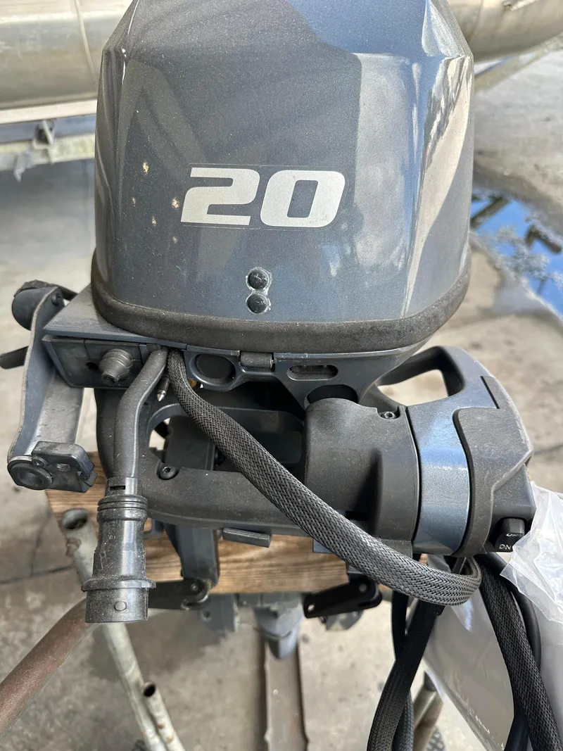 Slide: The Image of 2018 Yamaha Outboards F20LPA motor, close-up view of the engine. - 3
