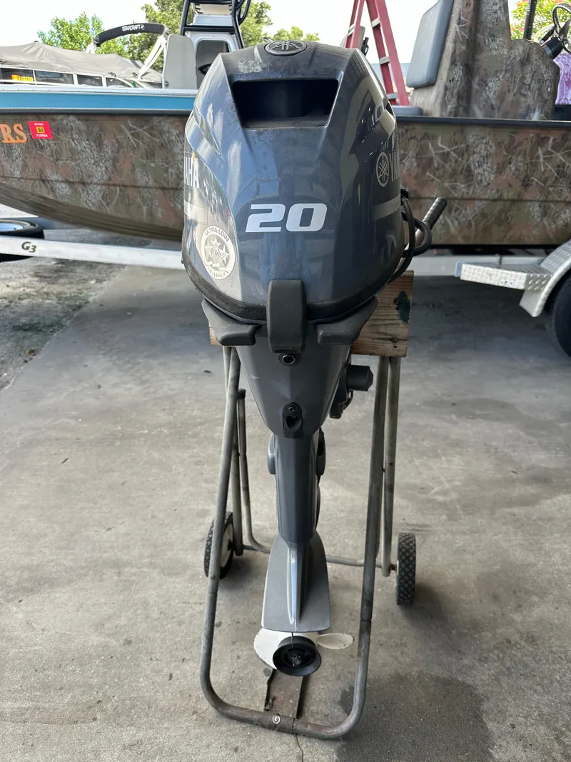 Slide: The Image of 2018 Yamaha Outboards F20LPA outboard motor on a stand. - 6