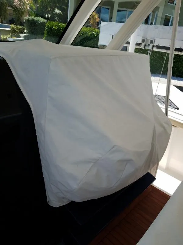 Slide: The Image of Covered console of a 2017 Pursuit S 408 Sport boat. - 12