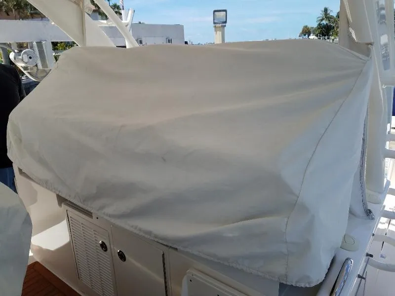 Slide: The Image of Covered console area of a 2017 Pursuit S 408 Sport boat. - 13