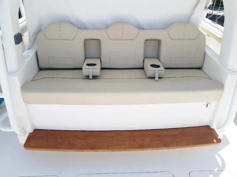Slide: The Image of 2017 Pursuit S 408 Sport boat seating with cup holders. - 14