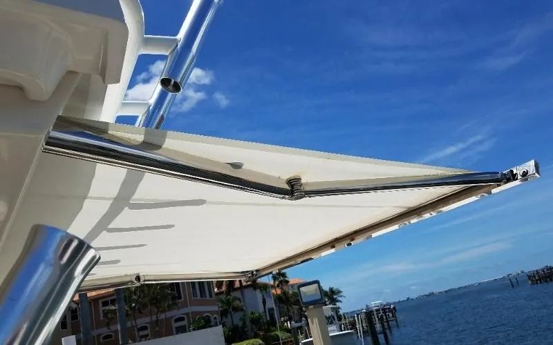 Slide: The Image of 2017 Pursuit S 408 Sport boat with extended sunshade. - 19