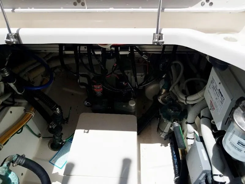 Slide: The Image of Engine compartment of a 2017 Pursuit S 408 Sport boat. - 28