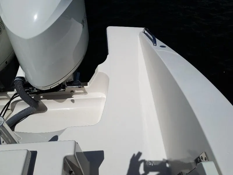 Slide: The Image of 2017 Pursuit S 408 Sport boat stern with outboard motor. - 33