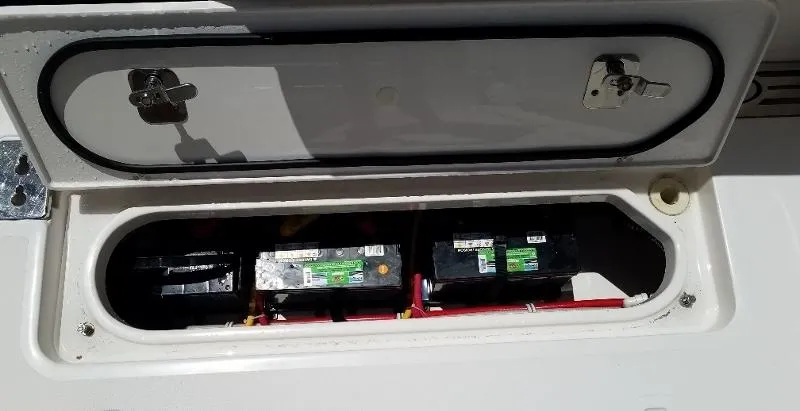 Slide: The Image of Battery compartment of a 2017 Pursuit S 408 Sport boat. - 36
