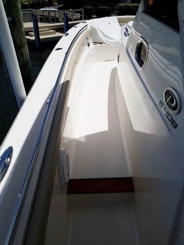 Slide: The Image of 2017 Pursuit S 408 Sport boat, side deck view, docked. - 42