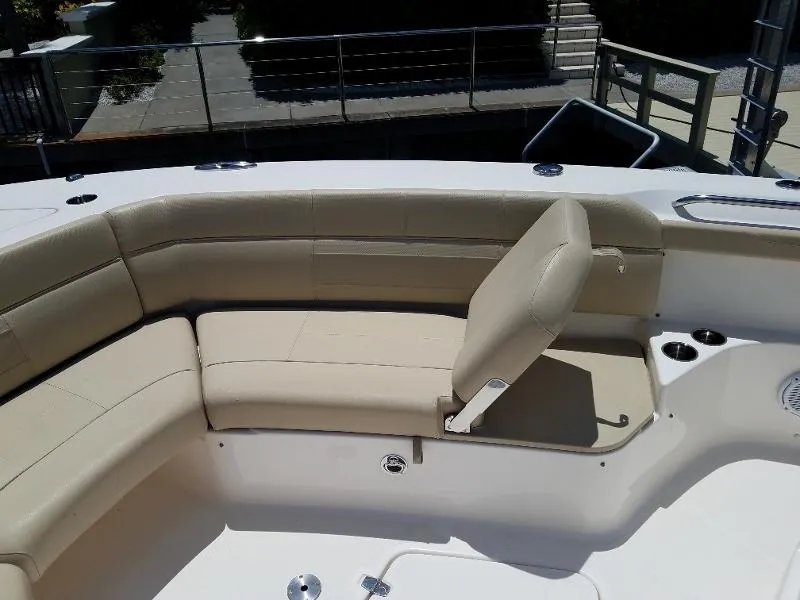 Slide: The Image of 2017 Pursuit S 408 Sport boat with beige seating and adjustable backrest. - 50