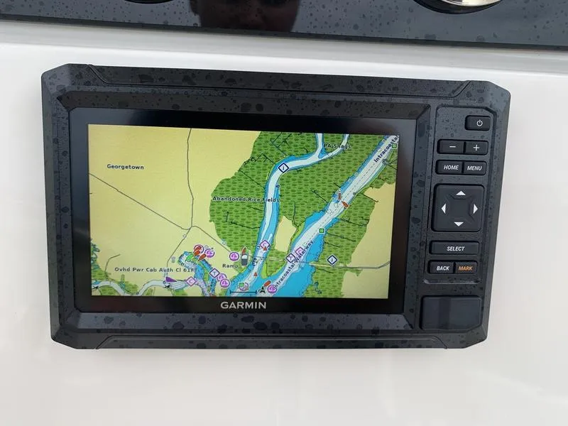 Slide: The Image of Garmin navigation system on 2025 Pioneer Islander 180 boat dashboard. - 19