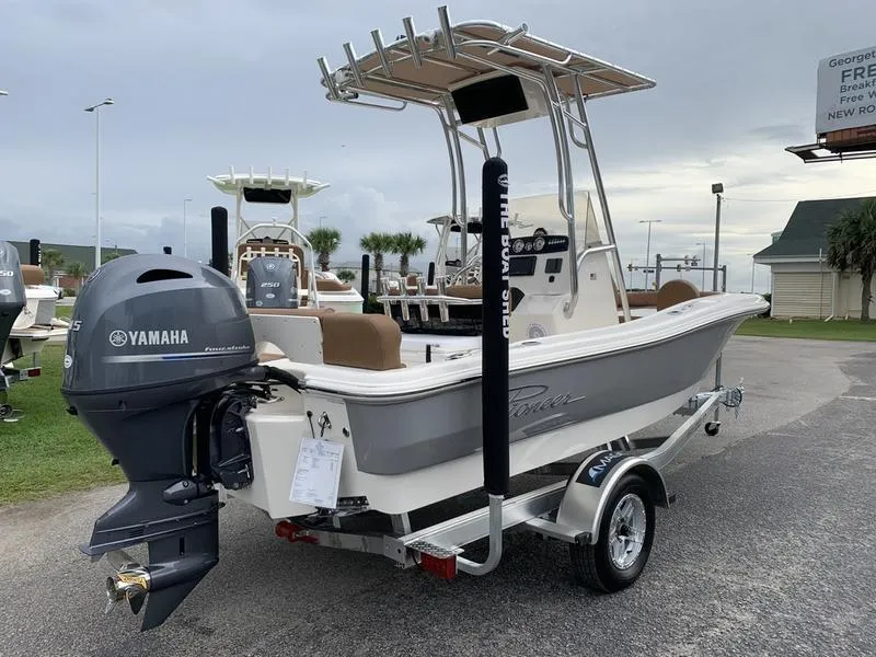 Slide: The Image of 2025 Pioneer Islander 180 boat with Yamaha outboard motor on a trailer. - 4