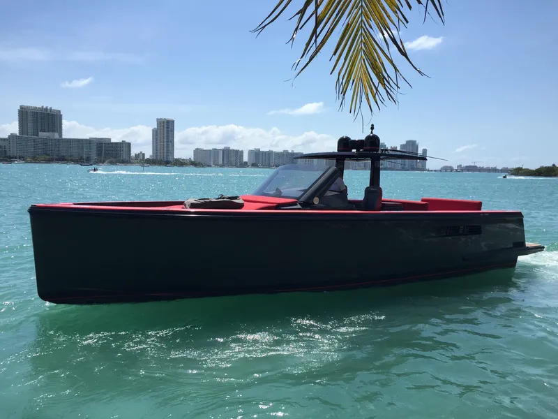 The Image of 2008 Fjord Express boat on turquoise water with city skyline in background. - 0