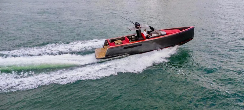 Slide: The Image of 2008 Fjord Express boat cruising swiftly on open water. - 13