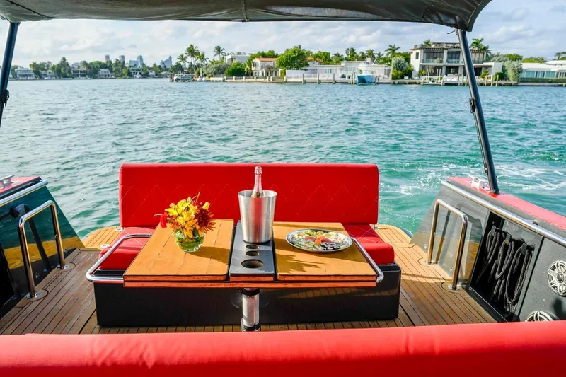 Slide: The Image of Luxury seating area on 2008 Fjord Express boat with scenic waterfront view. - 20