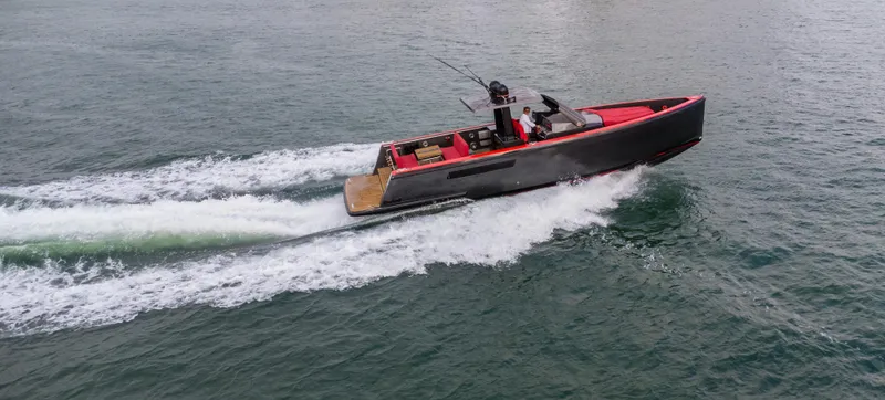 Slide: The Image of 2008 Fjord Express boat cruising on open water, showcasing sleek design and speed. - 4