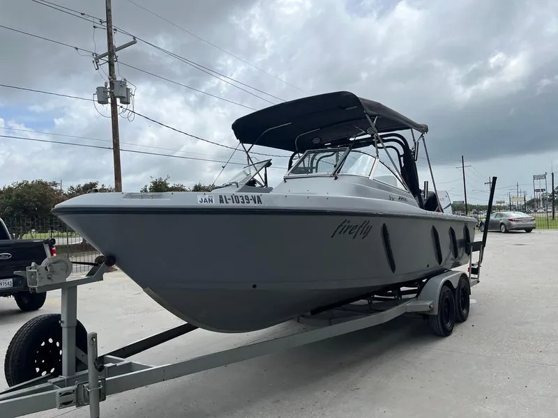 Slide: The Image of 2004 Pro-Line 2200 Dual Console boat on trailer, side view. - 6