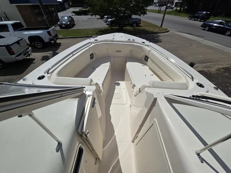 Slide: The Image of 2024 Grady-White Freedom 307 boat interior, spacious seating and storage. - 14
