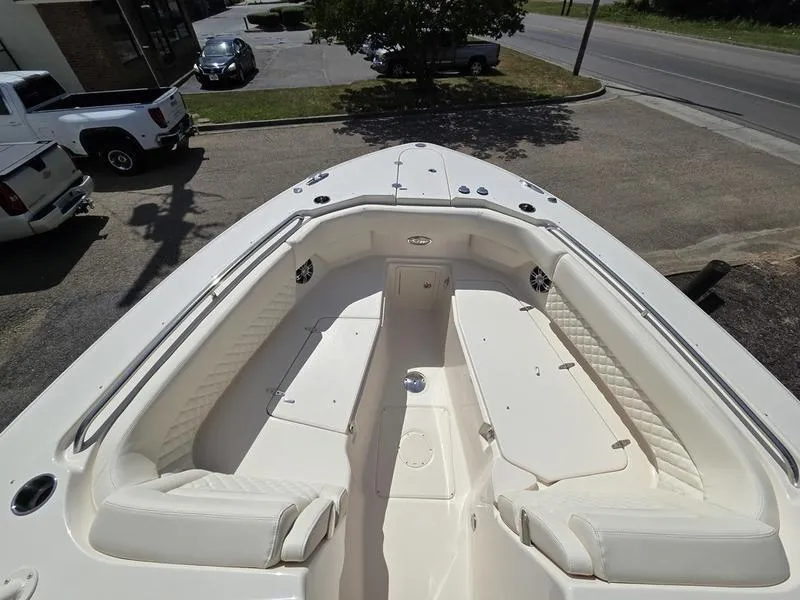 Slide: The Image of 2024 Grady-White Freedom 307 boat with spacious seating and sleek design. - 16
