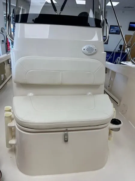 Slide: The Image of 2025 Grady-White Fisherman 180 boat interior with cushioned seating and storage. - 6