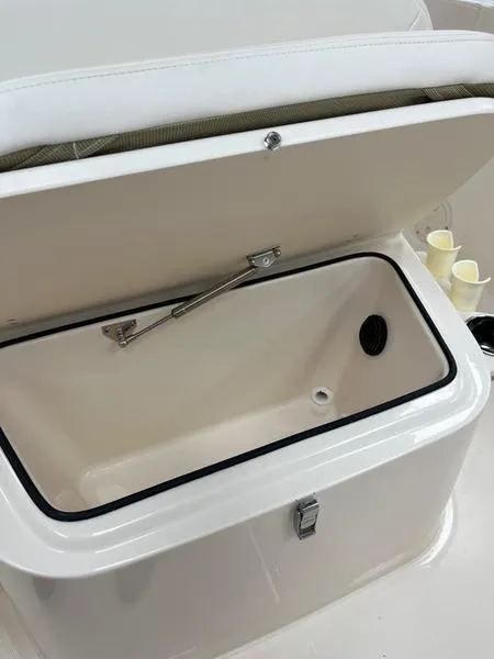 Slide: The Image of Open storage compartment on 2025 Grady-White Fisherman 180 boat. - 7