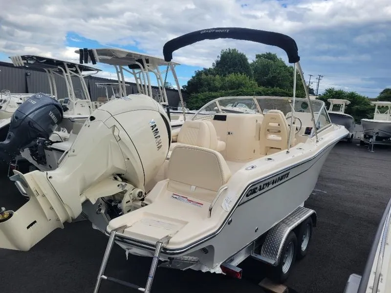 Slide: The Image of 2025 Grady-White Freedom 215 boat on trailer, featuring Yamaha outboard motor. - 4