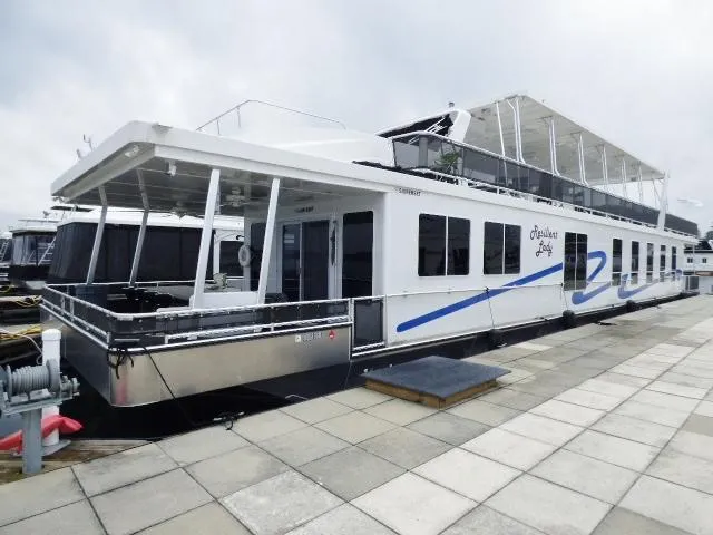 The Image of 2023 Sumerset 18x90 houseboat docked at marina. - 0