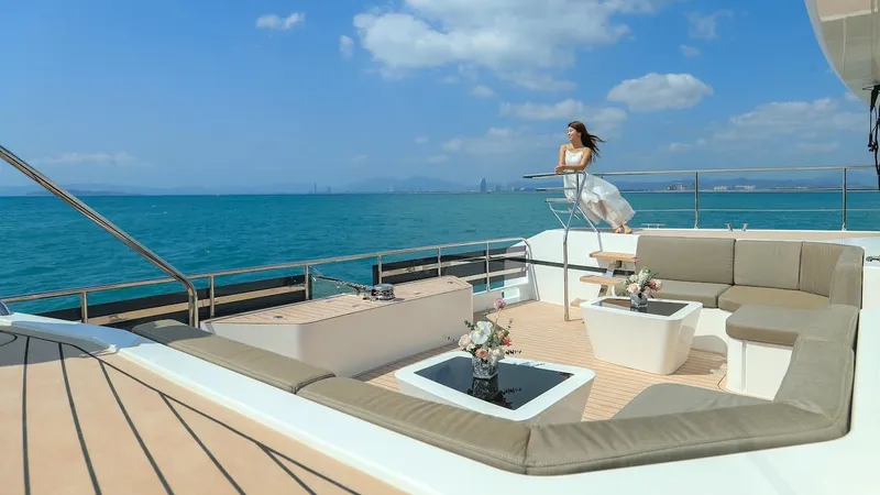 Slide: The Image of Luxury Catamaran Diamond Yachts EF56 2024 with elegant deck and ocean view. - 13