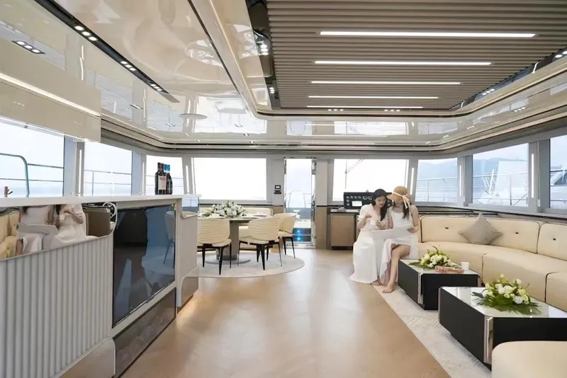 Slide: The Image of Luxurious interior of 2024 Catamaran Diamond Yachts EF56 with modern furnishings and elegant decor. - 15