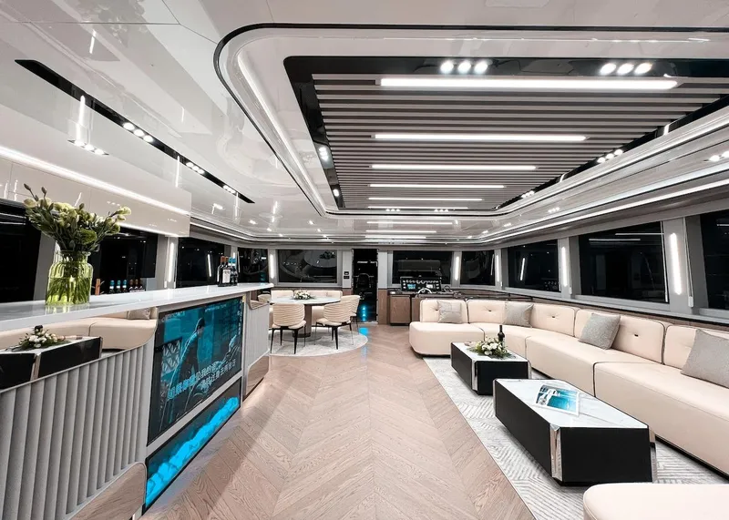Slide: The Image of Luxurious interior of 2024 Catamaran Diamond Yachts EF56 with modern design and spacious seating. - 20