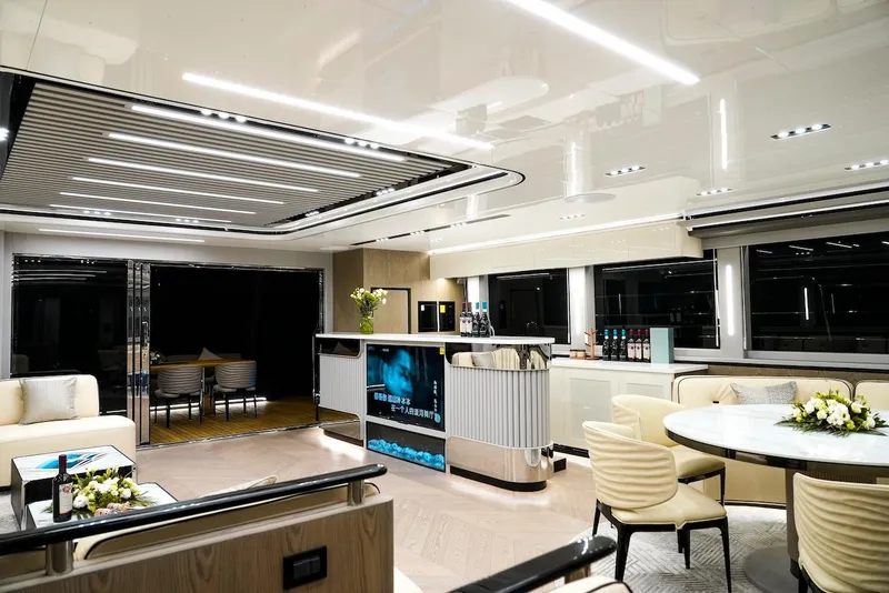 Slide: The Image of Luxurious interior of 2024 Catamaran Diamond Yachts EF56 with modern furnishings and ambient lighting. - 27
