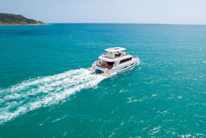 Slide: The Image of 2024 Catamaran Diamond Yachts EF56 cruising in open blue waters. - 3